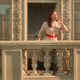 Amy Adams sings on a balcony.